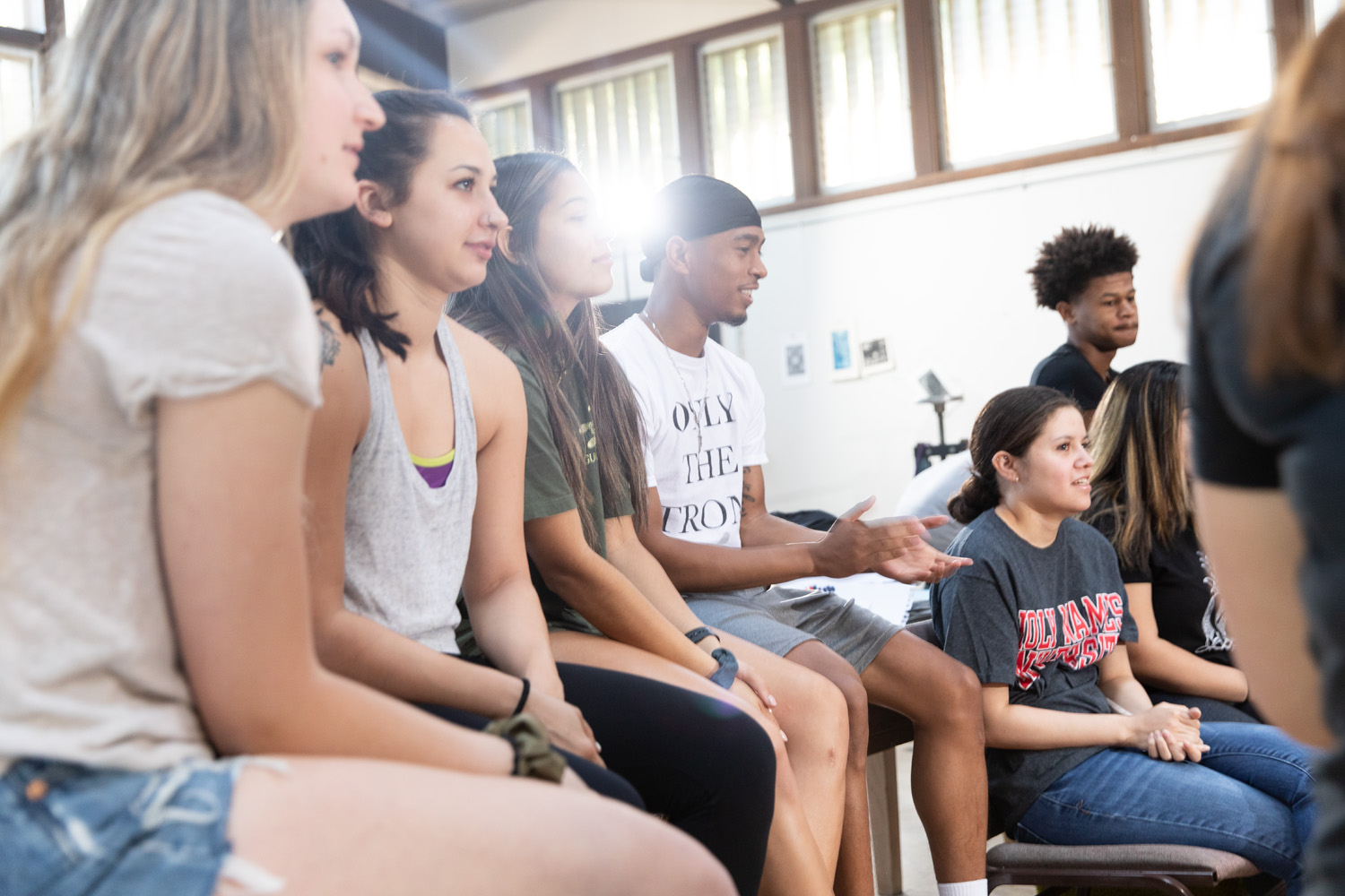 Holy Names University first-year students sitting together